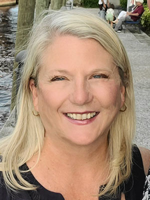 Headshot of Allison Reeves-Helfen.