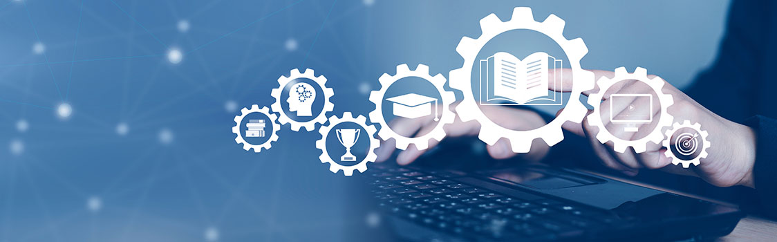 Icons representing learning, technology, and achievement appear as gear symbols above a keyboard while hands type against a blue, digital‑network background.