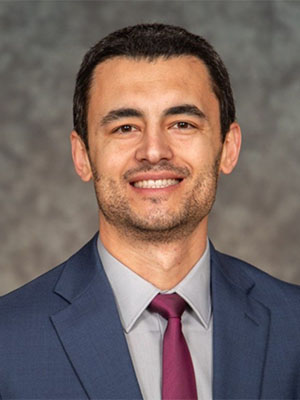 Headshot of Ismail Karabas.