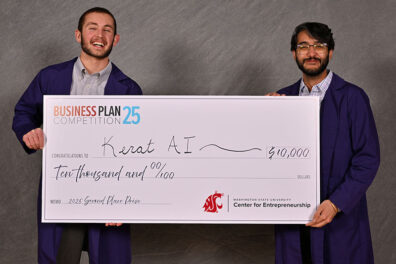 Mason Matich (left) and Jasson Makkar (right) pose with a ceremonial $10,000 check awarded to Kerat AI for second place in the Business Plan Competition 25, hosted by Washington State University Center for Entrepreneurship.