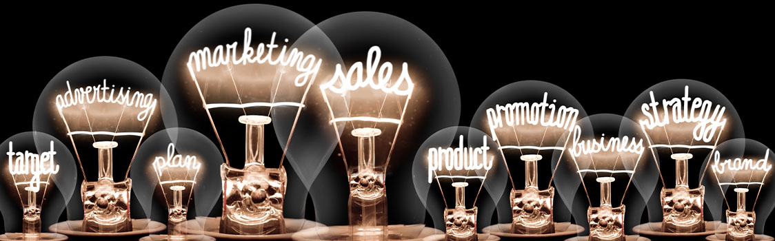 Series of light bulbs, each containing a business-related word: target, advertising, plan, marketing, sales, product, promotion, business, strategy, and brand.