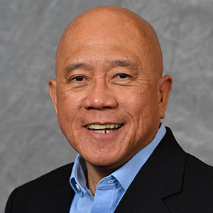 Headshot of Mario Reyes.