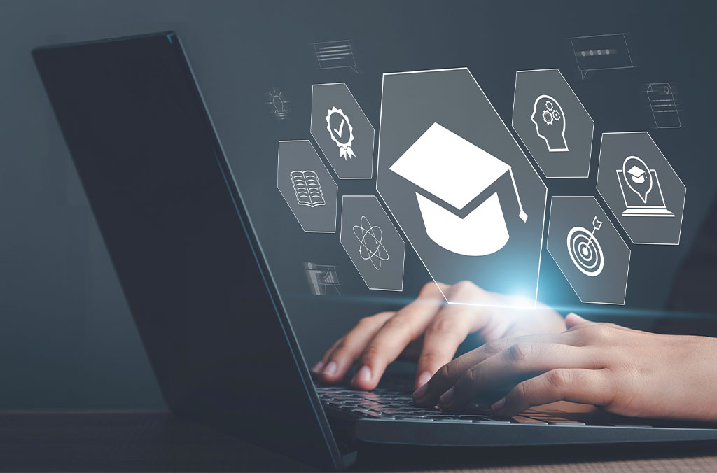 Person typing on a laptop with educational icons like a graduation cap, book, and atom floating above.