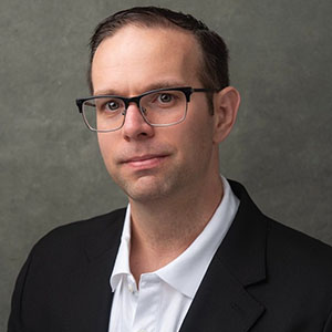 Headshot of Andy Lawrence.