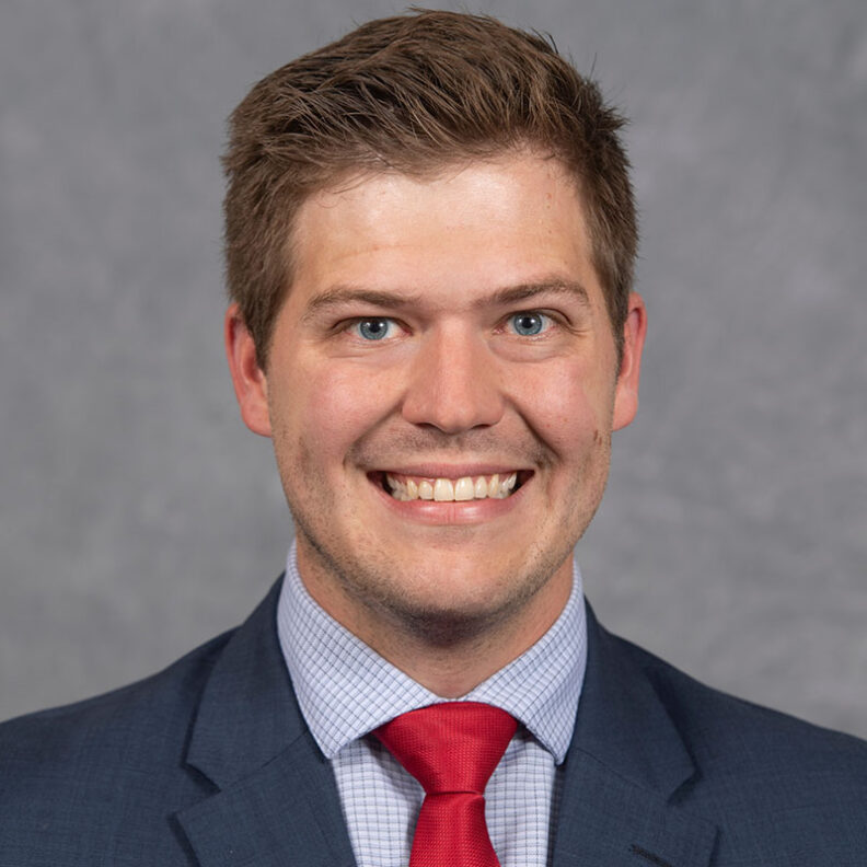 Headshot of Adam Bross.