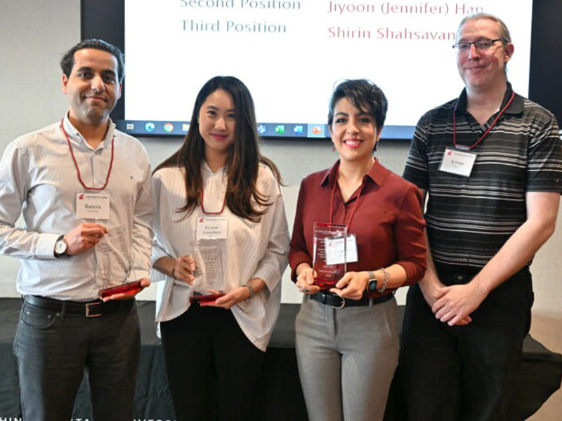 Group photo of participants holding awards at the WSU Graduate and Professional Student Association Research Exposition and Academic Showcase.