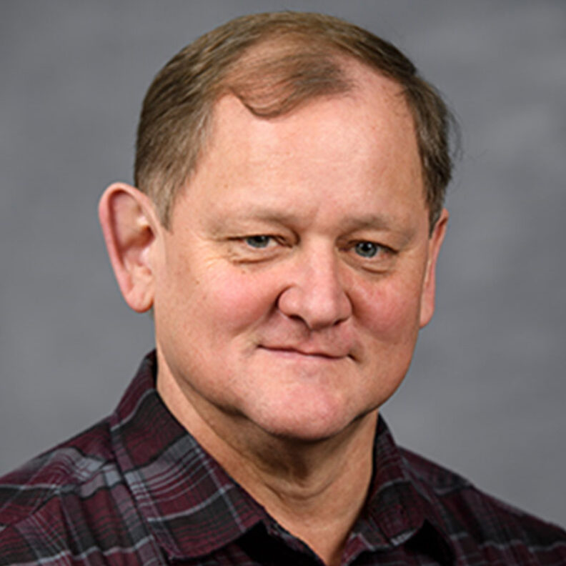 Headshot of Adam Bross.