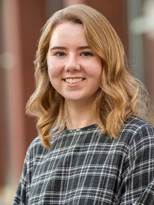 Headshot of Jasmine Carringer.