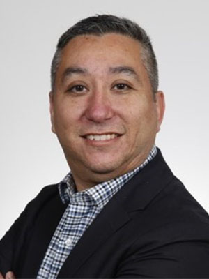 Headshot of Alberto Preciado.