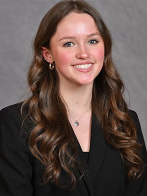 Headshot of Kendall Larson.