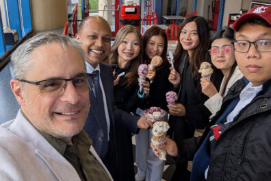 CamEd Business School students and Jeff Joireman gather for a selfie while holding ice cream cones at Ferdinand’s Ice Cream Shoppe.