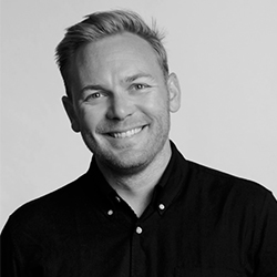 Grayscale headshot of Cole Morgan.