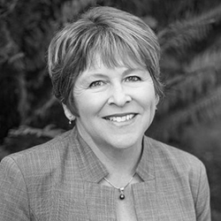 Grayscale headshot of Lisa Brown.