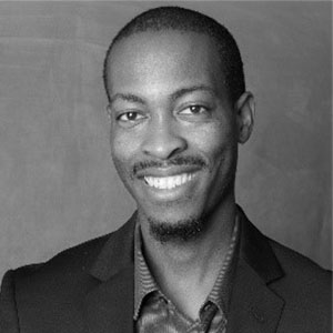 Grayscale headshot of Philip Jacobs.