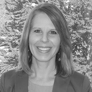 Grayscale headshot of Staci Taylor.