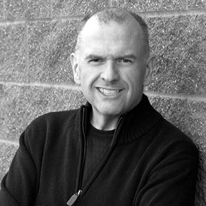 Grayscale headshot of Wade Larson.