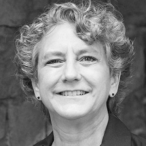 Grayscale headshot of Julie Nelsen.