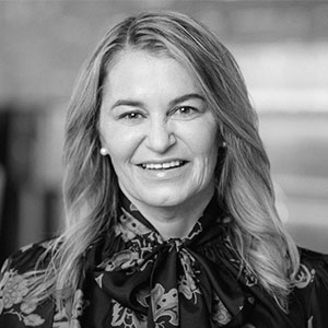 Grayscale headshot of Rachel Ruggeri.