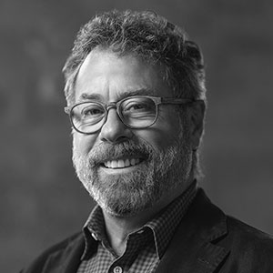 Grayscale headshot of Kurt Dammeier.