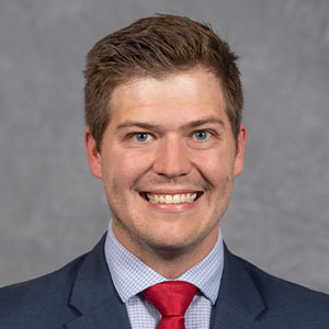 Headshot of Adam Bross.