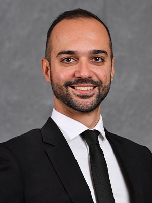 Headshot of Amirhossein Moadab.