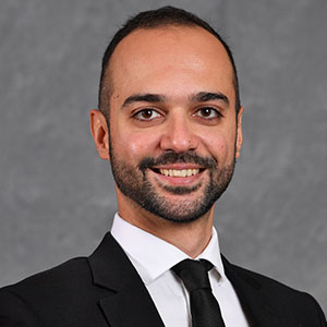 Headshot of Amirhossein Moadab.