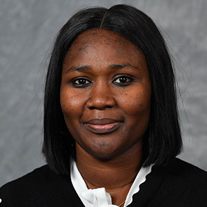 Headshot of Mariam Hilda Ola.