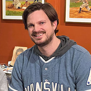 Headshot of Marq Evans.