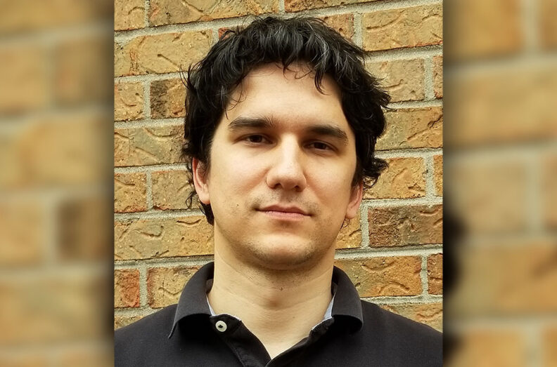 Headshot of Daniel Aughenbaugh.