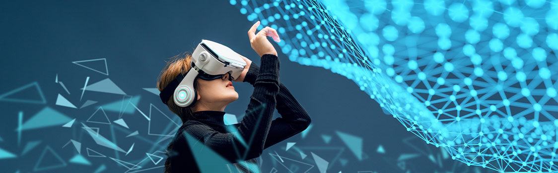 Person wearing a virtual reality headset and reaching upward, surrounded by abstract blue geometric shapes and a digital network pattern.