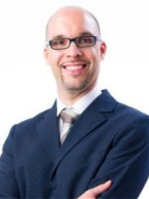 Headshot of Christoph Schneider.