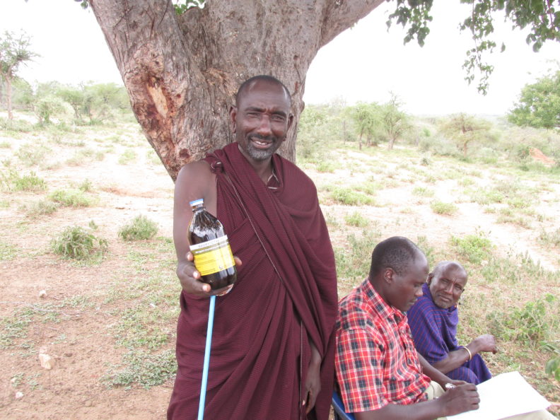 Man with antibiotics under tree