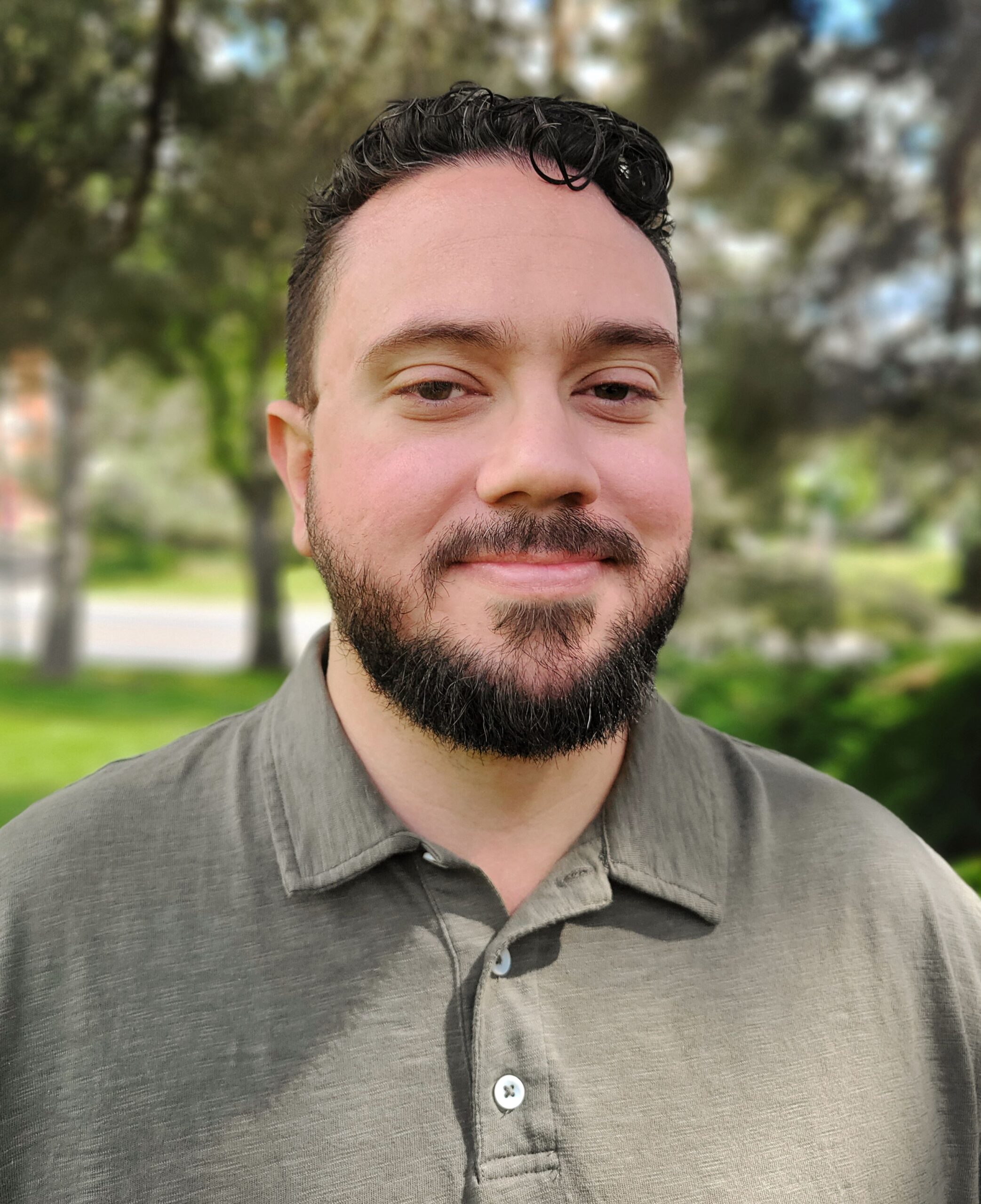 Dr. Kristopher Smith Standing outside smiling