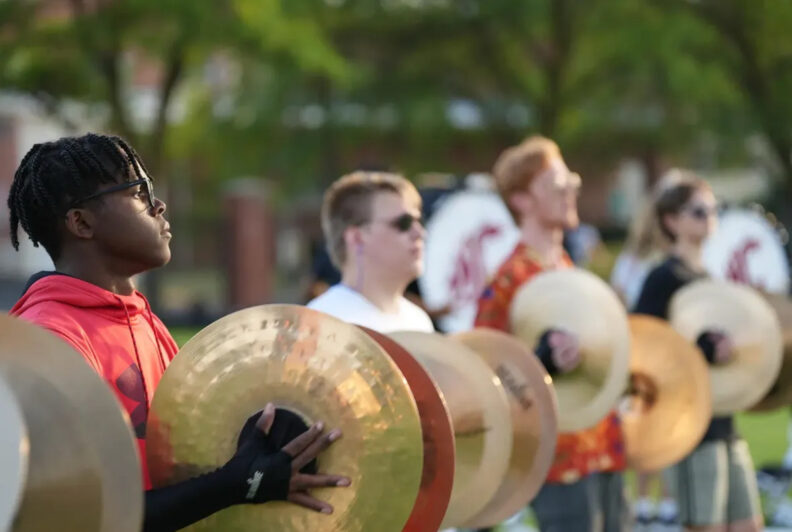 Cougar Marching Band cymbal section practicing
