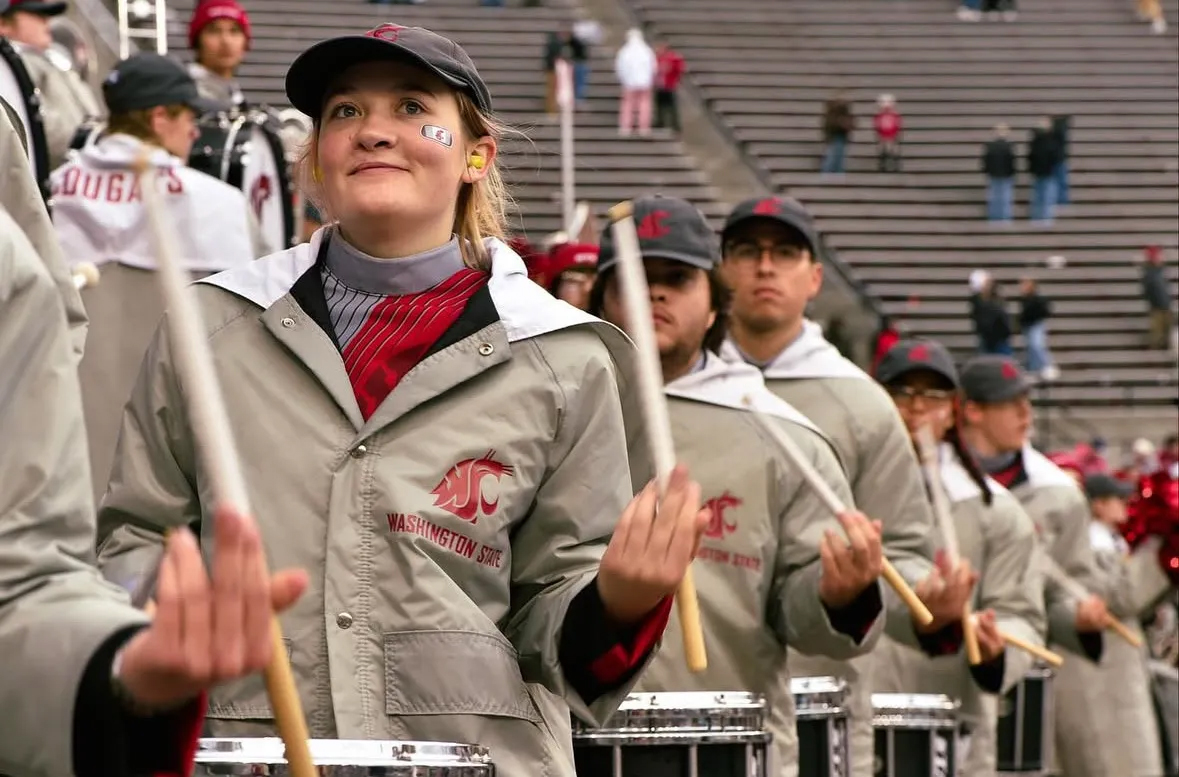 Cougar Marching Band snare drum section performing