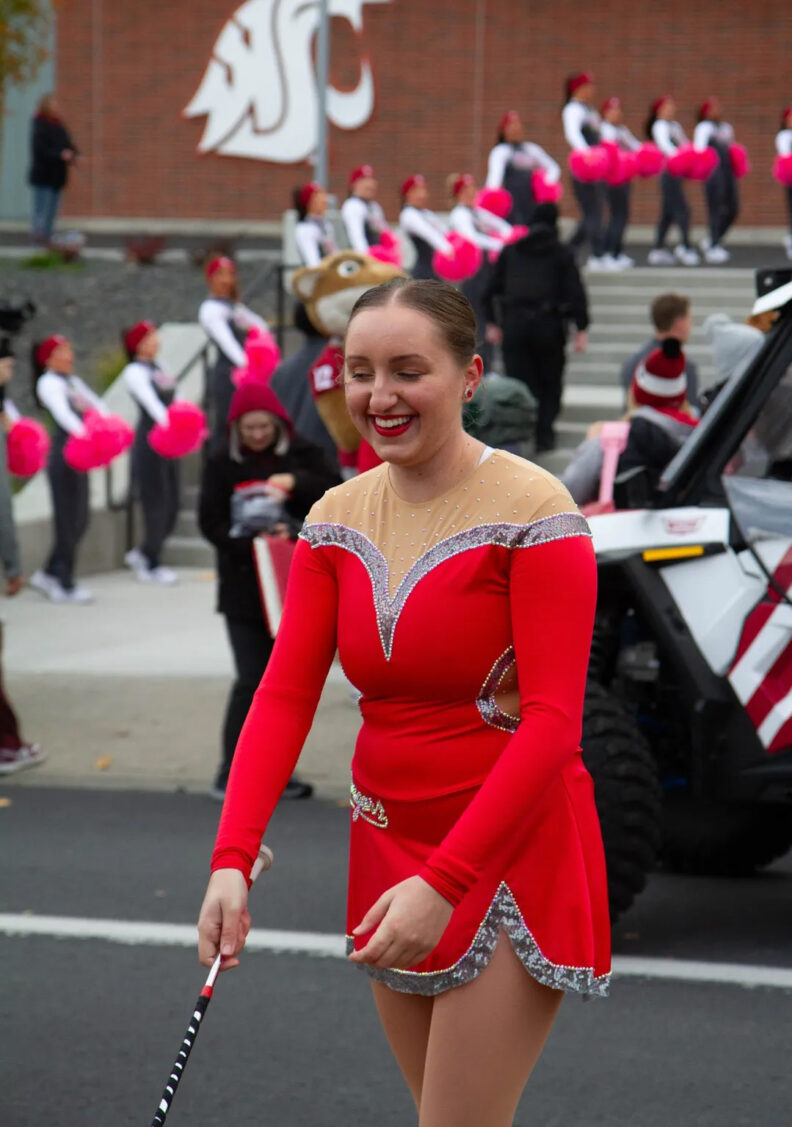 Cougar Marching Band twirler performing