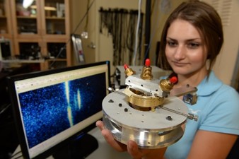 A student carries pressure equipment