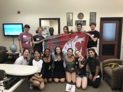 SLCR Students holding a WSU Cougar flag
