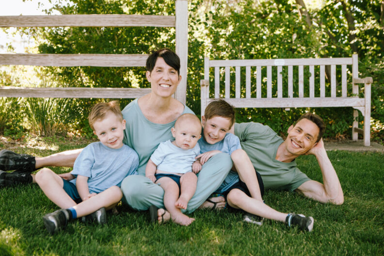 A photo of the Cutler-Kremer family sitting on a lawn