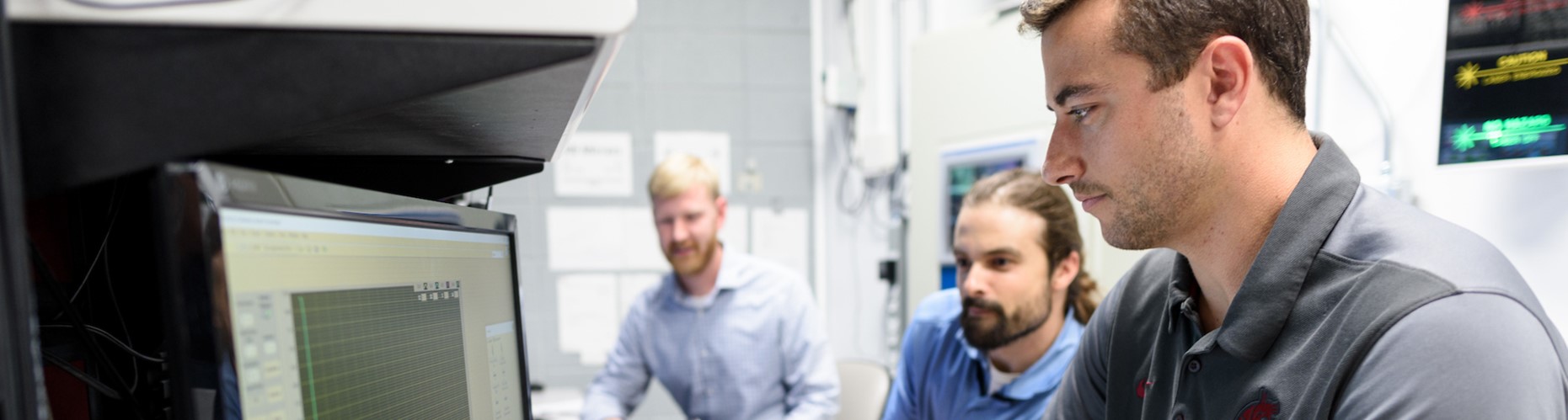 people looking at computer screens