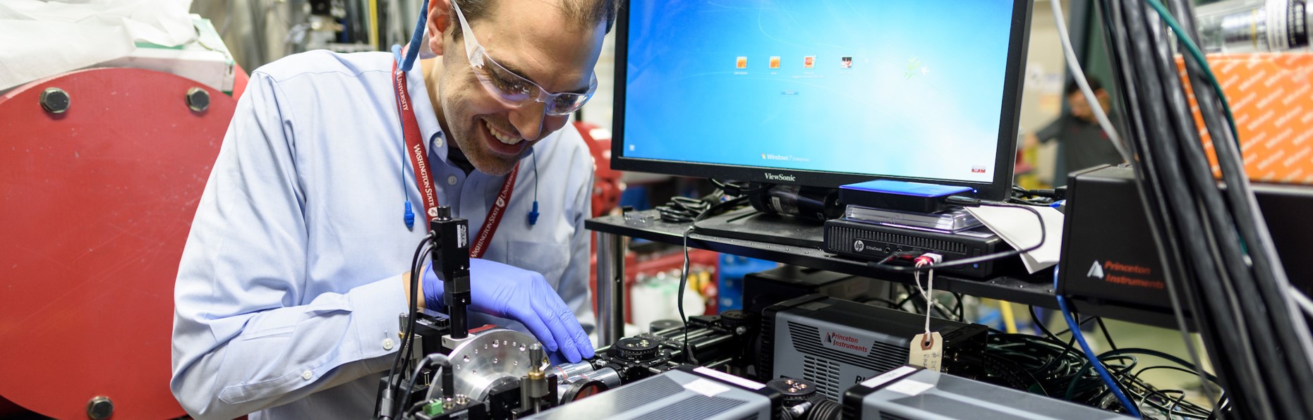 person looking at equipment