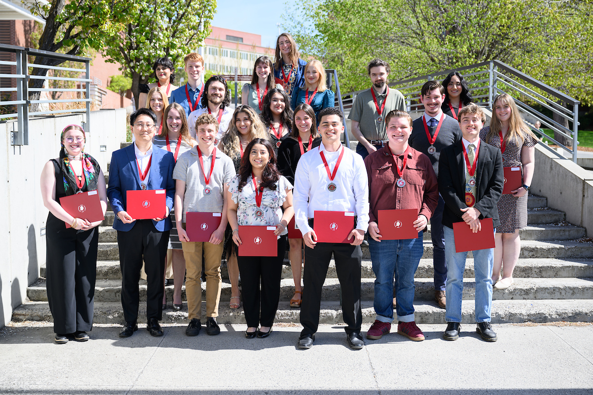 Group photo outside with the 2024 Outstanding Seniors.
