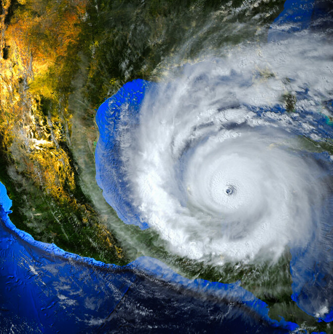 Satellite image of a hurricane approaching North and South America.