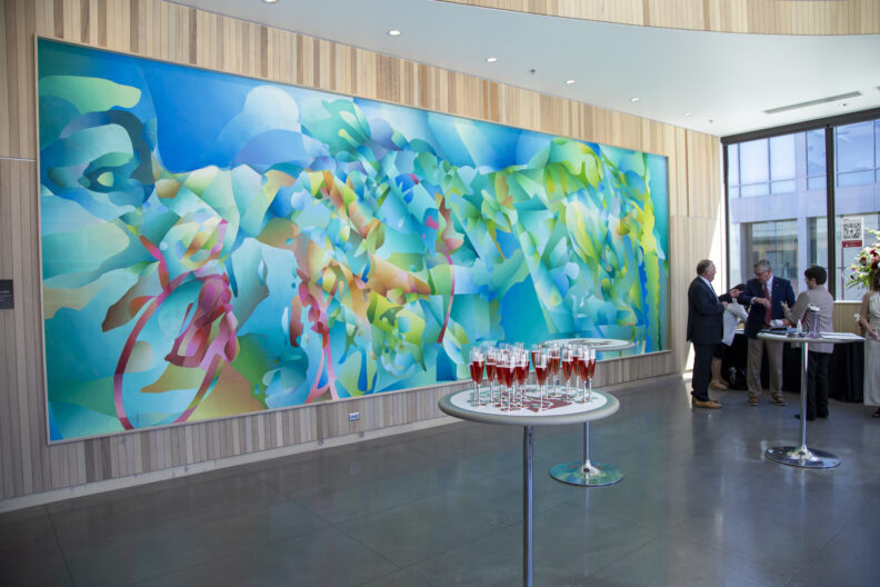 "Life" is a large wide painting spanning a large wall in the Life Sciences Building.