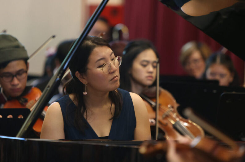 Yoon-Wha Roh performing with orchestra.