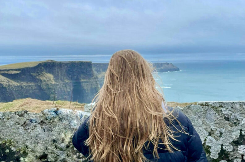 Fitzgerald looking out at the Cliffs of Moher in Ireland.