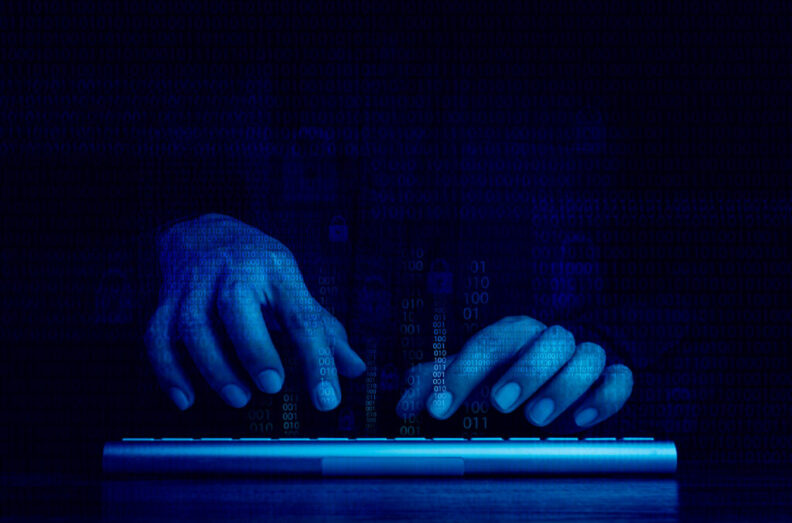A composite featuring a darkly lit pair of hands typing on a keyboard and several lines of computer code.