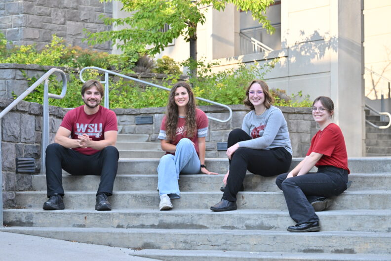 Four CAS Student Ambassadors outside on the WSU Pullman campus.