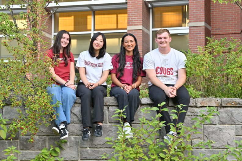 Four CAS Student Ambassadors outside on the WSU Pullman campus.