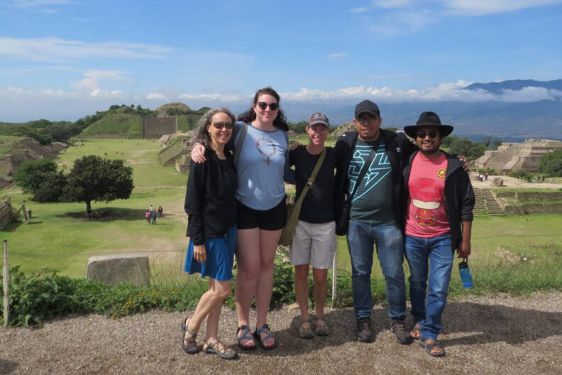 WSU professor Erin Thornton (center) poses with research collaborators at Monte Alban, Oaxaca, Mexico.
